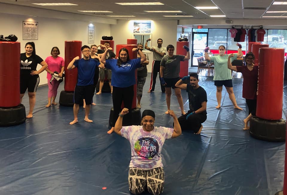 Group of boxers gathered after training session