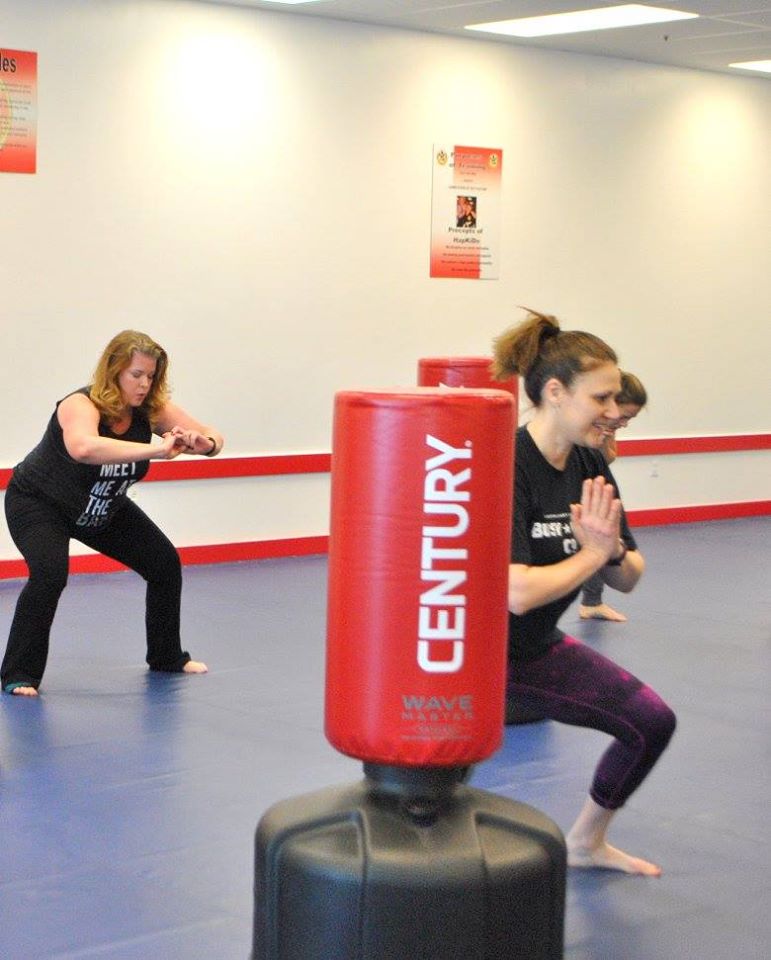 Group of women kickboxing in a high-energy fitness class in Alpharetta GA