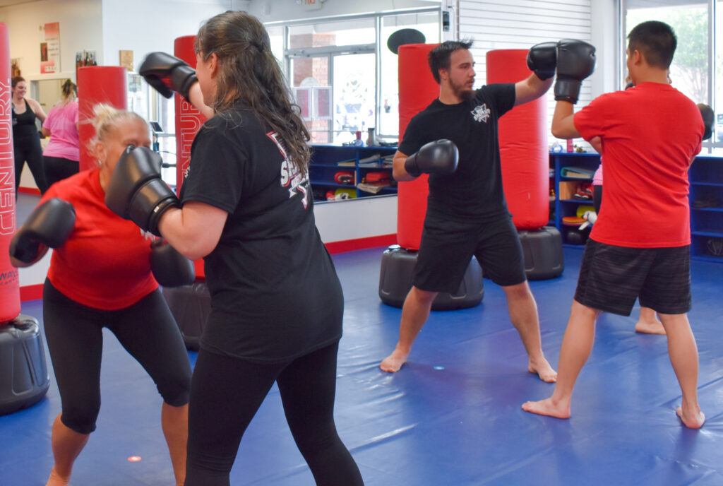 Kickboxing class in Duluth Georgia with community members training together