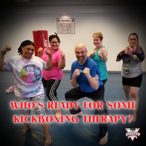 Instructor-led group kickboxing class in Duluth Georgia